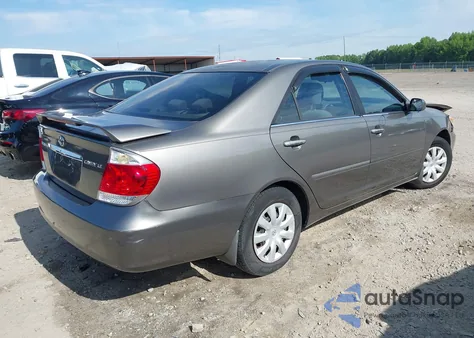 2006 Toyota Camry Le z USA, uszkodzony, nr VIN 4T1BE32KX6U698737